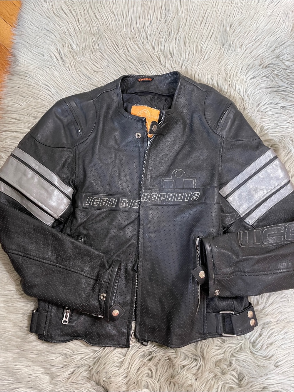 ICON Black Leather Motorcycle Jacket with Silver Stripes